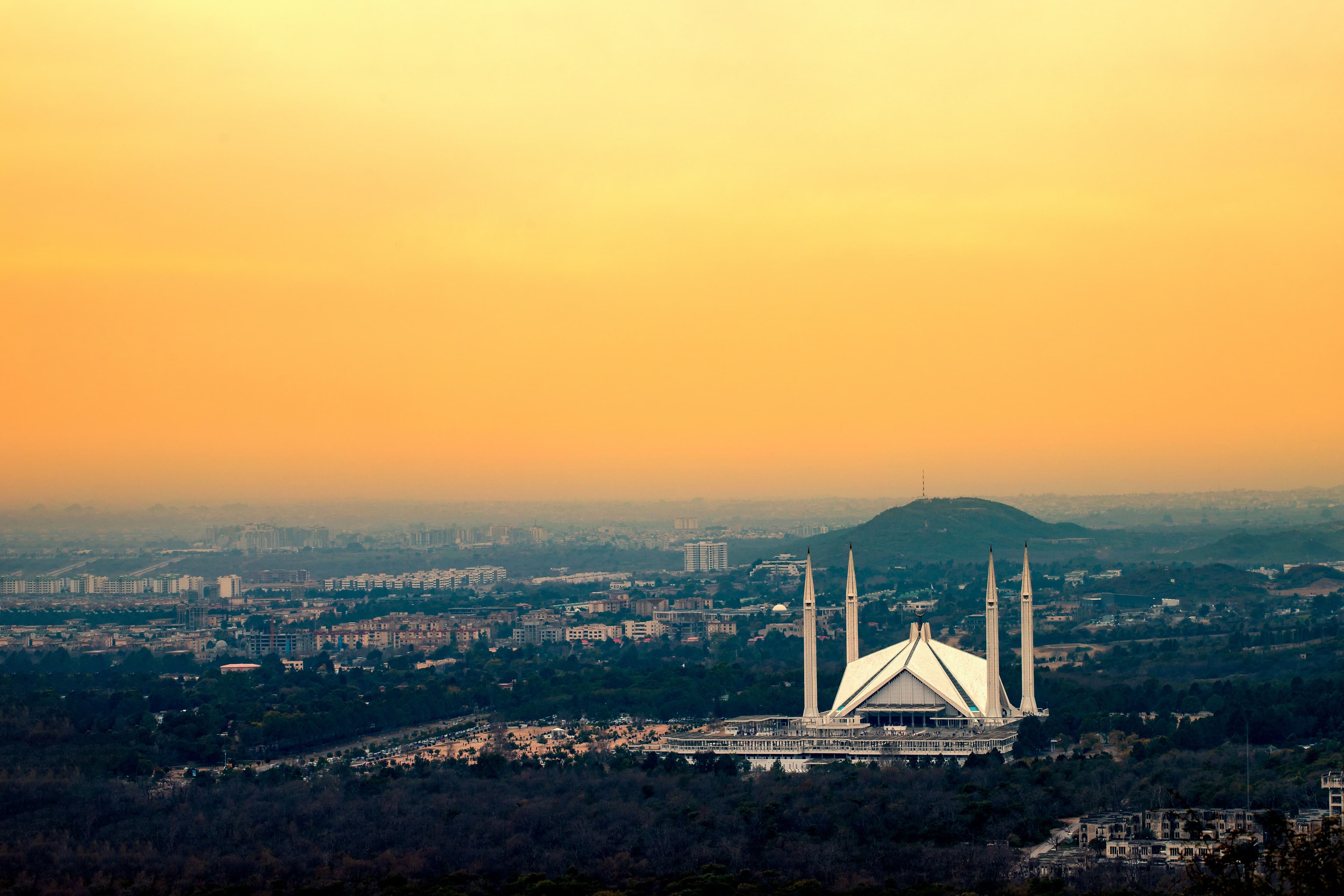 The Faisal Mosque and Islamabad skyline at sunset